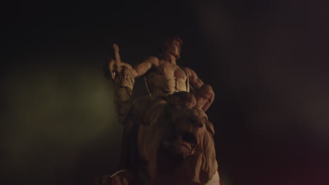 epic, ancient stone statue at night