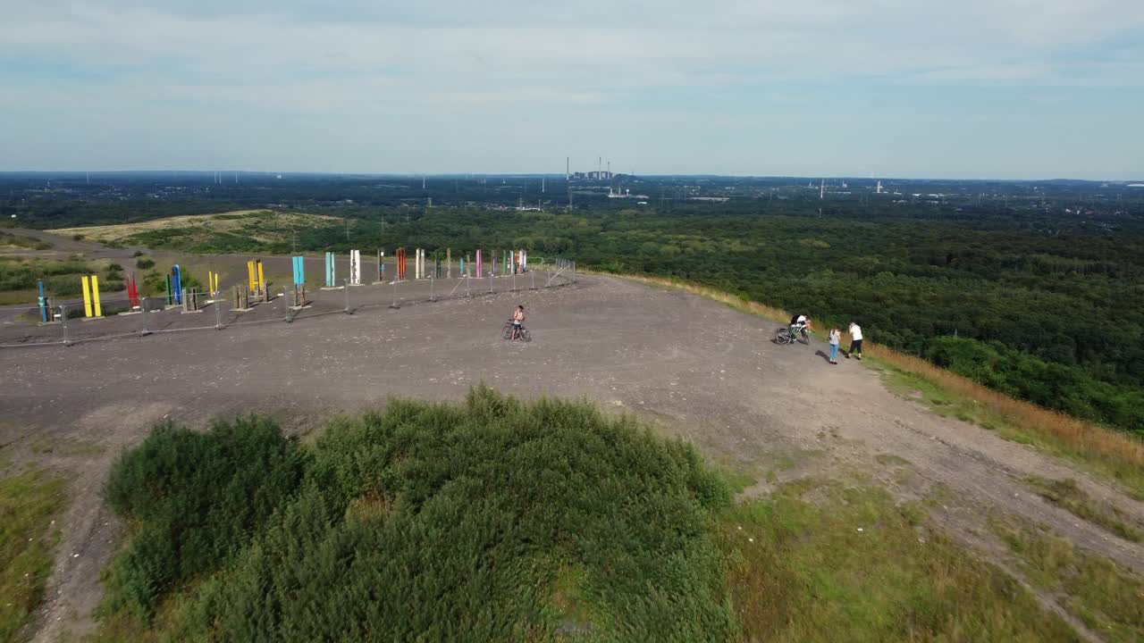 Hilltop Landscape with People and Artwork