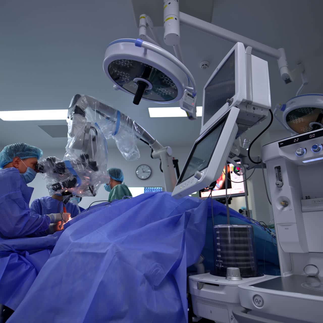 Lung ventilator machine working during the neurosurgical operation. Experienced doctor uses advanced equipment in his work