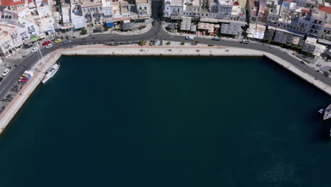 Aerial:-Flying-slowly-over-Ermoupoli-city-of-Syros-island,-Greece-on-a-sunny-day