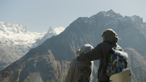 friends enjoying mountain scenery