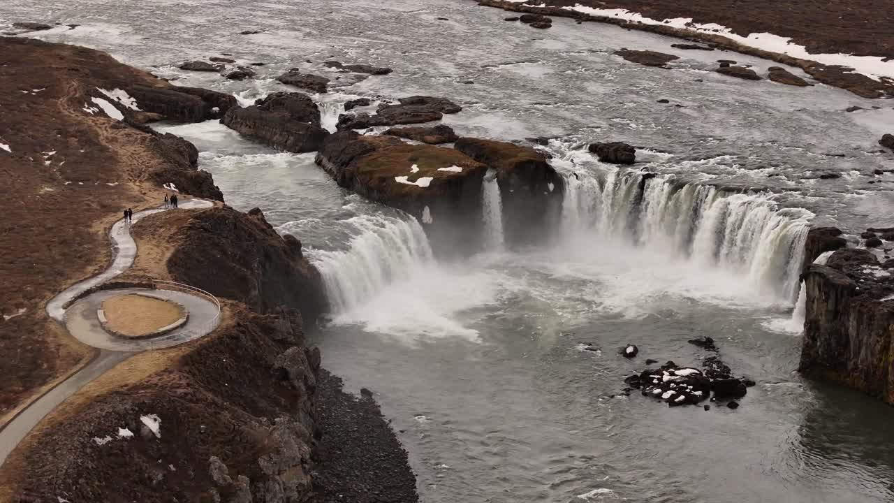 Circling Drone Shot of Goðafoss Waterfall in Iceland, Overcast Winter Day