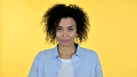 portrait of attractive casual african woman saying no by finger