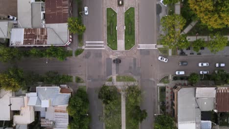 Aerial-top-down-shot-flying-over-catholic-church-at-golden-hour