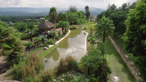 nestled within picturesque landscape of etla, an aerial view reveals charming eco cottages retreat that seamlessly blends with nature