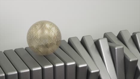 gold sphere on gray metal blocks