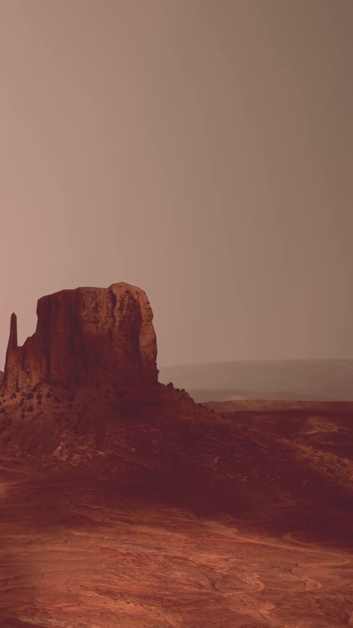Paesaggio desertico con formazioni rocciose e cielo serale nella Monument Valley