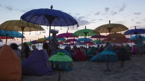colorful beach sunset with people