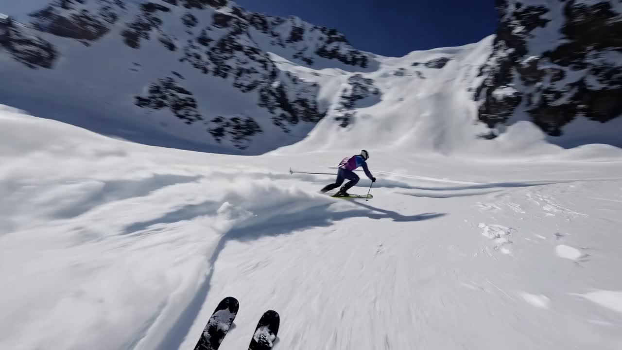 POV video of a skier racing down a snowy mountain slope, capturing dynamic motion and speed
