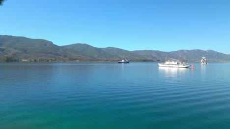 blue colour water of love's bay beach in poros island greece