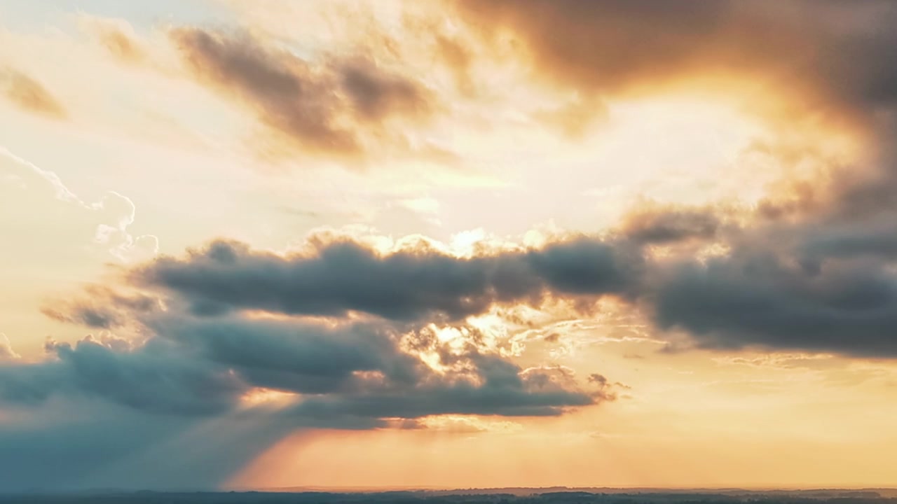 Sunlight Bursting Through A Moving Cloudscape. Timelapse
