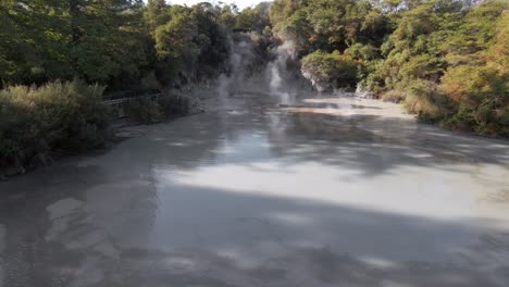 slow push in above boiling mud pools at waiotapu, rotorua, new zealand