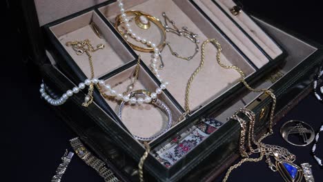 Open-Jewel-Box-with-Jewellery-Scattered-Slide-Left---could-be-a-robbery
