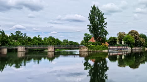 Pedestrian bridge leading to Mitterwöhr island over the Isar River in Landshut, Germany