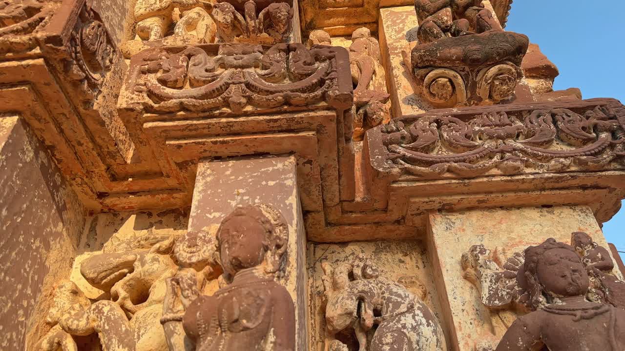 jib down shot of a Beautiful old temple carved in stone