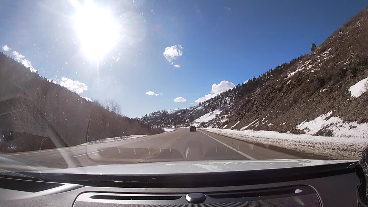 traveling thru a mountain pass in the winter time in Colorado in hd 1080p 60p