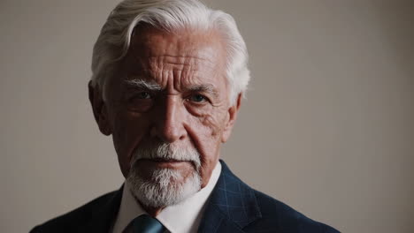 close-up portrait of an elderly man in a suit