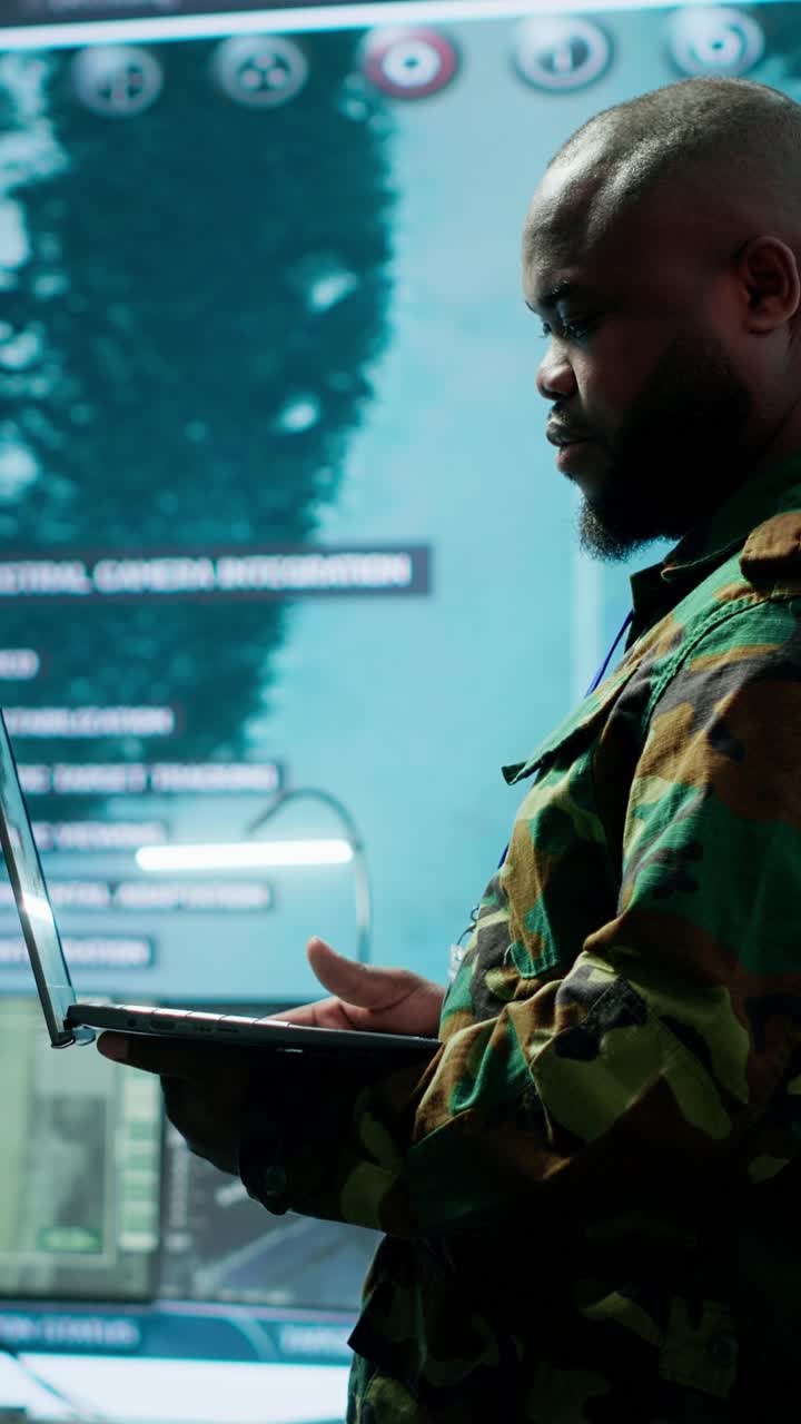 Vertical Video Military team manages cybersecurity operations in a high tech control center