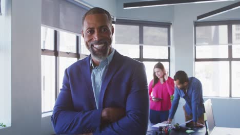 businessman looking at camera in modern office