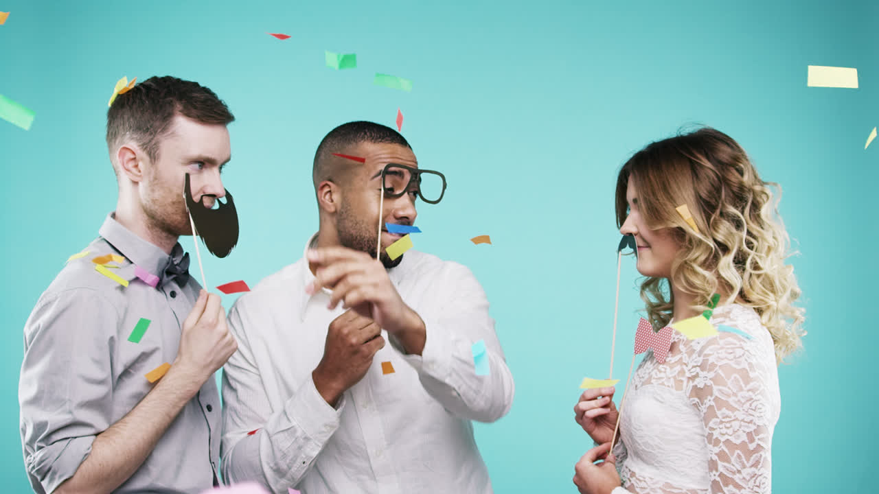 Mixed race man dancing with friends slow motion party photo booth