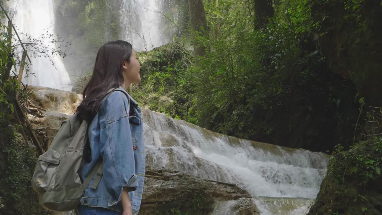 Happy Girl With Waterfall, Slow Motion
