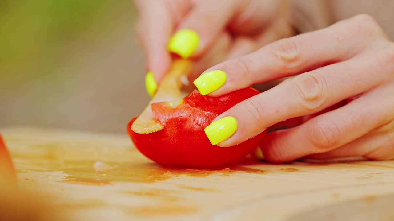Eco Knife Cuts Core from Fresh Tomato in Close Up Slow Motion Nature Scene