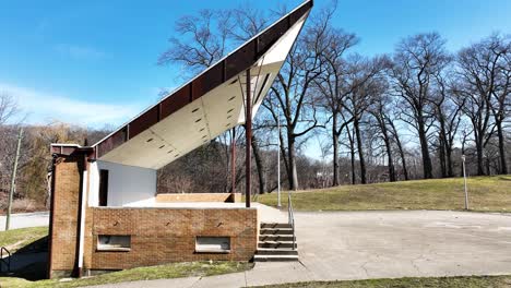 outside theatre structure at muskegon's mcgraft park in early springtime