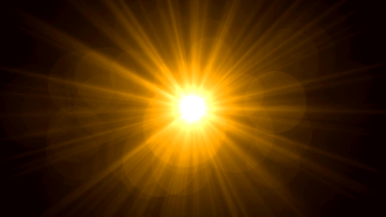 Luce dorata o gialla 4K con bokeh su sfondo nero. Sfondo animato per motion graphic e animazione