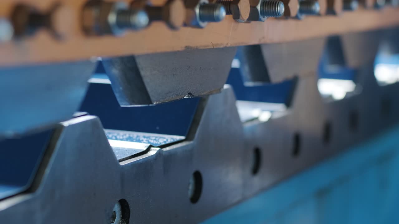 Metal sheet forming machine at the modern metalwork factory.