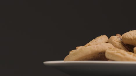 Close-Up-Shot-of-a-Plate-of-Cookies-Rotating-