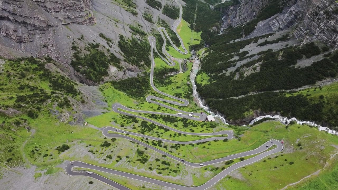 Aerial Reveal of Stelvio Pass Road and Braulio Valley in Northern Italy