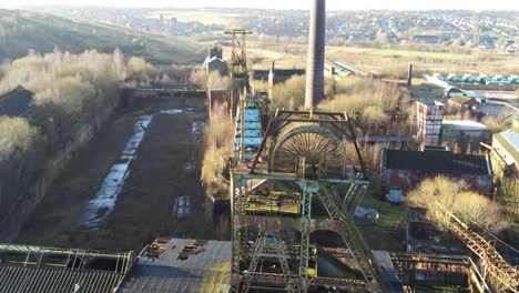 abandoned run down staffordshire historical industrial coal mine buildings aerial view