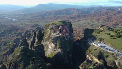 4K-Meteora-Greece-Monestary,-The-Great-Meteoron,-Monestary-on-a-Mountain,-Landscape---Aerial-Drone,-Μετέωρα,-Ελληνικά-Meteora-Greece,-Monk,-Nun,-Fall-colors,-Sunset,-Ancient-Greece,-Cinematic,-God