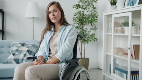 woman in wheelchair in living room