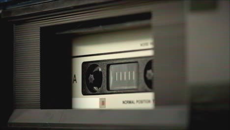 close-up of a vintage cassette tape player