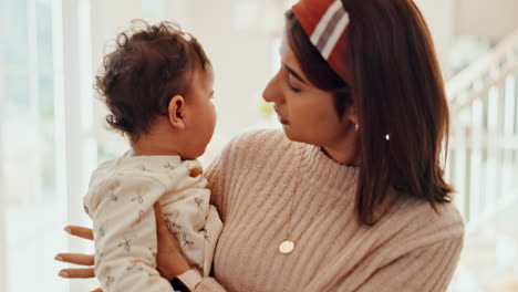 mother comforting her crying baby