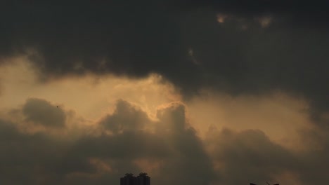 panning sunrise timelapse of cityscape sillhouette in the morning in johor bahru city, malaysia, asia