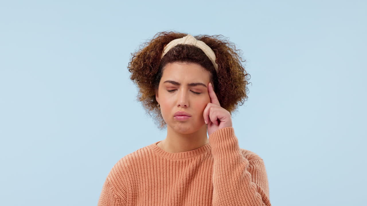 Thinking, confused and face of woman on blue