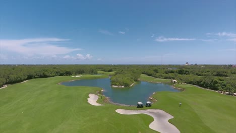 beautiful-views-from-a-drone-of-a-golf-course-in-the-riviera-Maya,-Yucatan,-Mexico