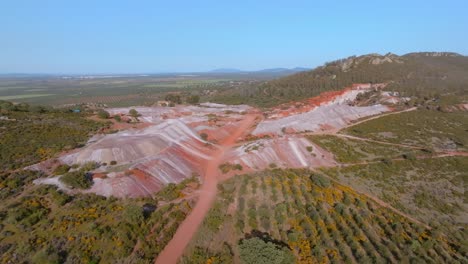 circling the scarred and barren landscape of an old abandoned lead mine