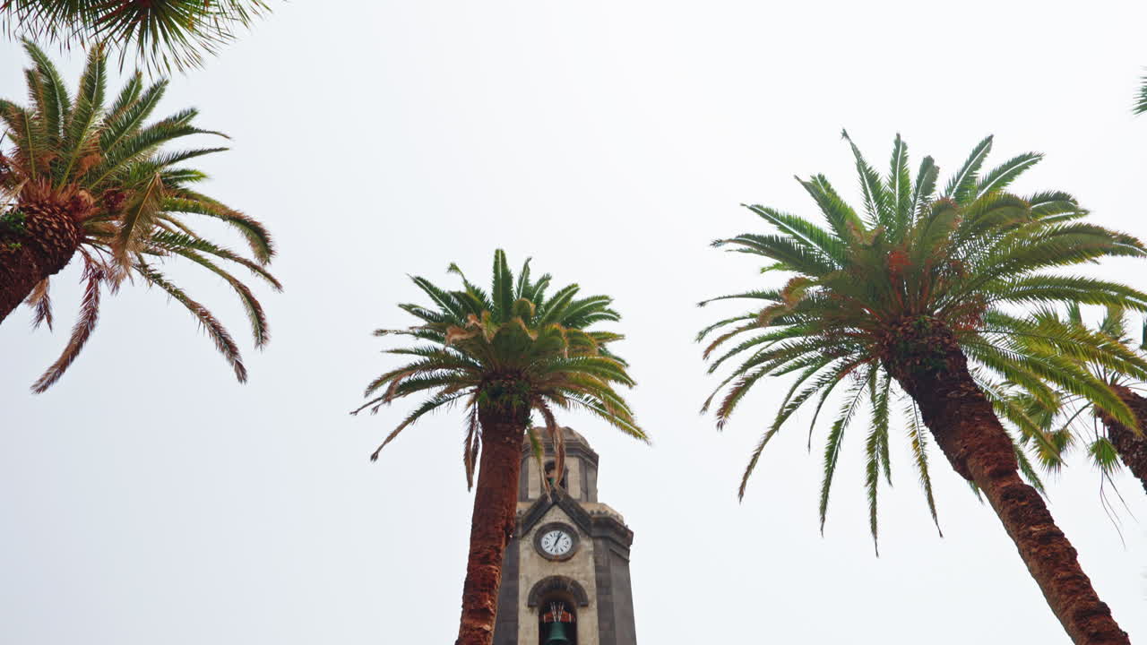 Closeup shot of the bell tower of a local church in Puerto de la Curz in Tenerife, Canary Islands, Spain.