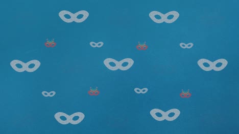 Animation-of-carnival-mask-repeated-on-blue-backgroud