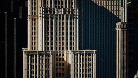 classic architectural details of a skyscraper in new york during late afternoon