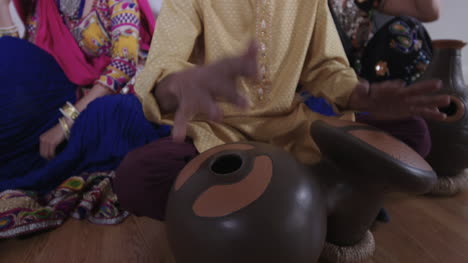 indian percussion musician with dancers 09