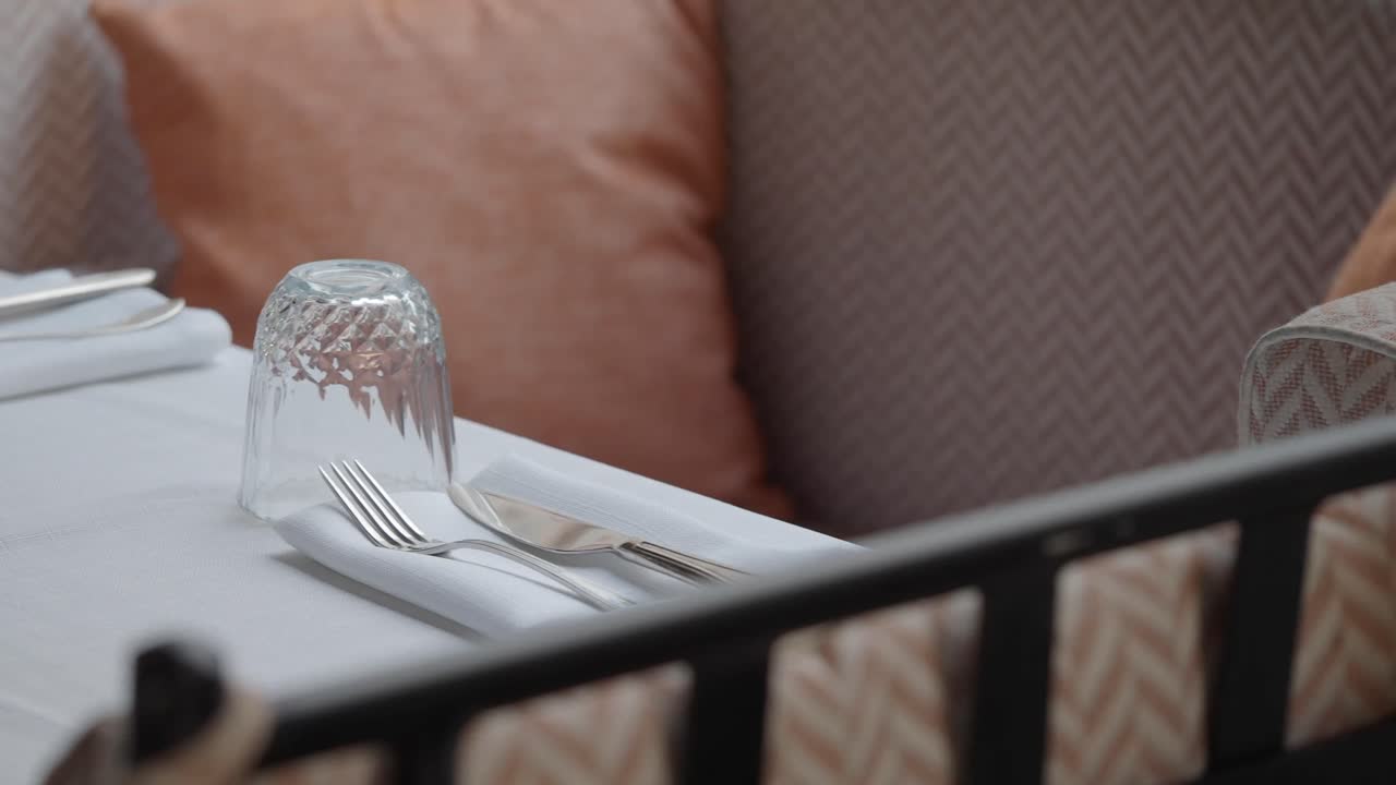 Restaurant Table Set with Cutlery, Glasses, and Ashtray