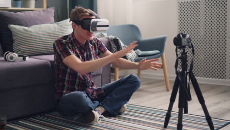 man in vr headset recording a video blog