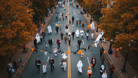 a vibrant halloween parade - colorful costumes and festive decorations fill the streets as participants celebrate in exciting spooky atmosphere of joy and community spirit