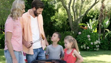 happy family is preparing a barbecue in the garden
