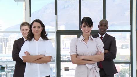 Determinded-Business-team-standing-with-arms-folded