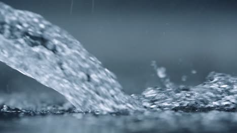 rain water flowing over a concrete surface